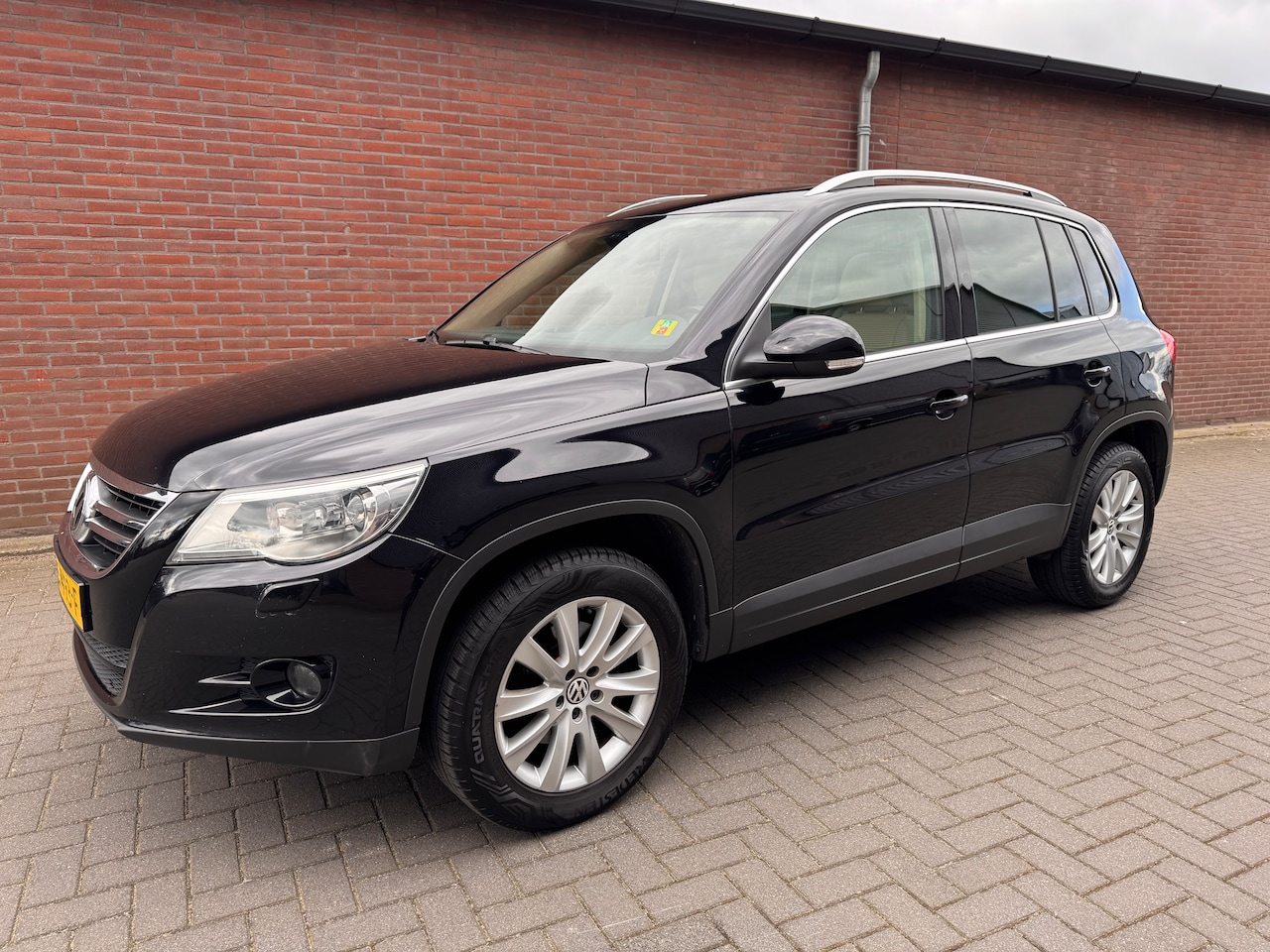 Volkswagen Tiguan - 2.0 TFSI Sport&Style 4Motion PANO/NAV/LEER/TREKHAA/XENON - AutoWereld.nl