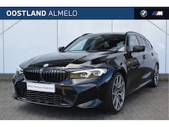 BMW 3-serie Touring - 318i High Executive M Sport Automaat / Panoramadak / Trekhaak / Sportstoelen / Stoelverwar