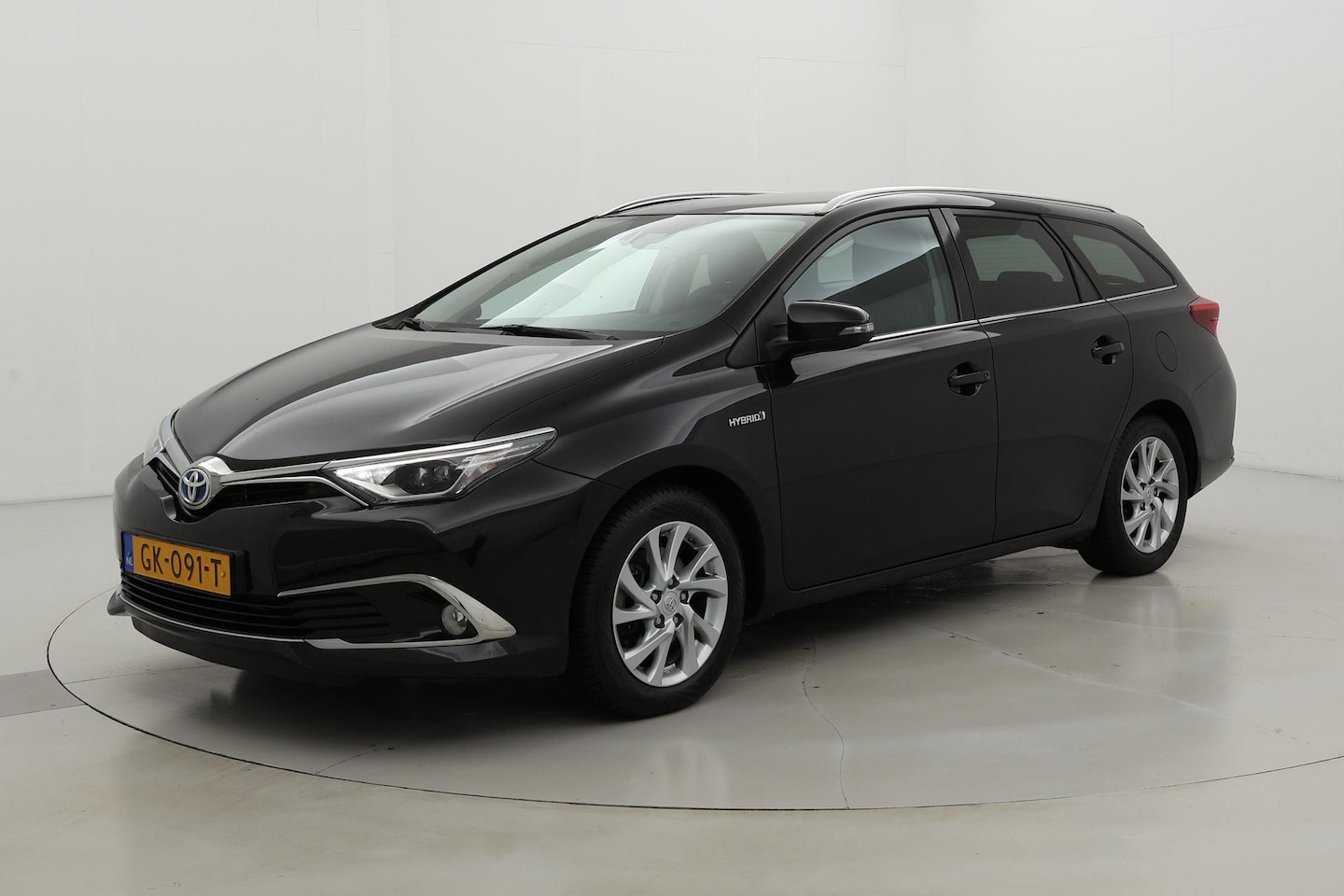 Toyota Auris Touring Sports - 1.8 Hybrid Lease pro | Panoramadak | Navigatie - AutoWereld.nl