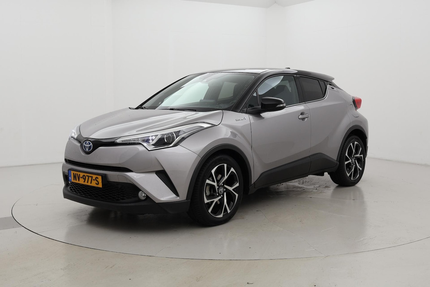 Toyota C-HR - 1.8 Hybrid Bi-Tone Navigatie - AutoWereld.nl