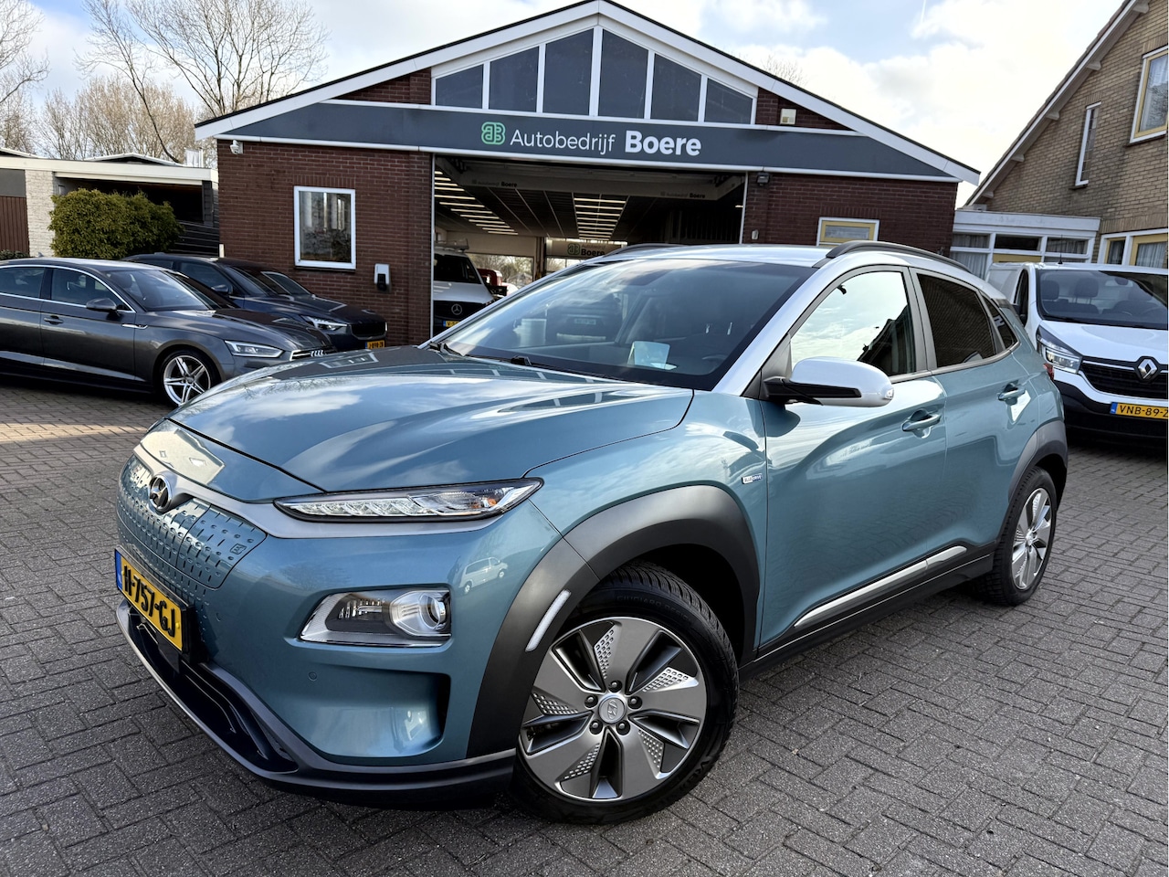 Hyundai Kona Electric - EV Premium 64 kWh Leer, Navi, Camera, Carplay - AutoWereld.nl