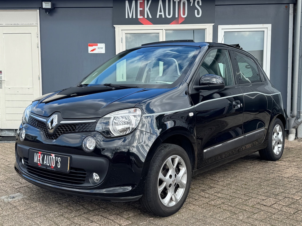 Renault Twingo - 1.0 SCe Intens|Airco|Cruise|Open Dak|Org Km|2e Eigenaar| - AutoWereld.nl