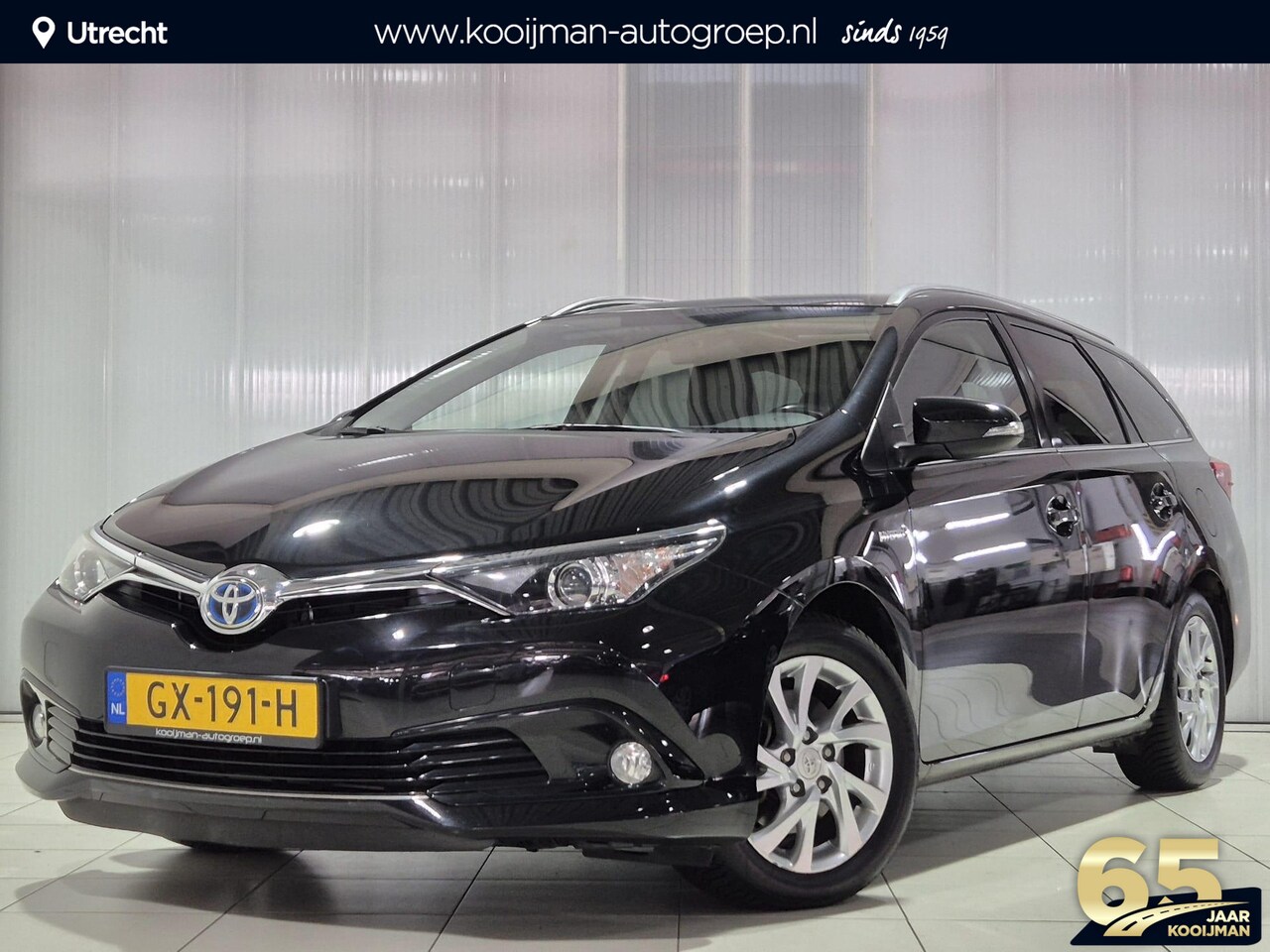 Toyota Auris Touring Sports - 1.8 Hybrid Lease | Panoramadak | All season banden | - AutoWereld.nl