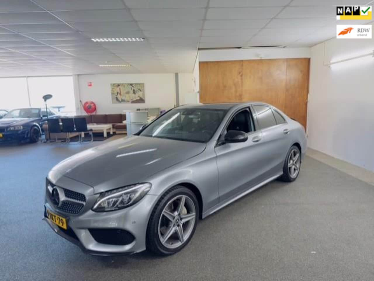 Mercedes-Benz C-klasse - 180 AMG Line Apk Nieuw,N.A.P,Cruise,Clima,PDC,Leder,Xenon,Navi,Lm velgen,Topstaat!! - AutoWereld.nl