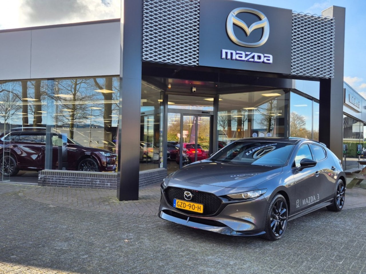 Mazda 3 - E- SKYACTIV- G 2.5 140 6MT M-HYBRID HOMURA / AERO-PAKKET - AutoWereld.nl