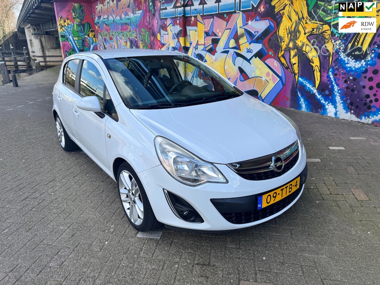 Opel Corsa - 1.2 Anniversay Edition LPG super mooie auto rijd nieuw met navigatie 5 deuren airco boeken - AutoWereld.nl