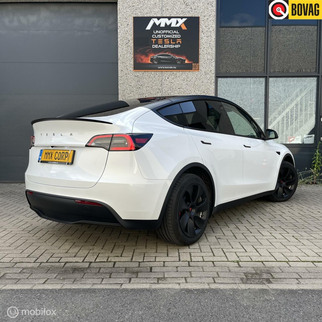 Tesla Model Y - Wit 2023 MMX PACK STAGE 2 - AutoWereld.nl