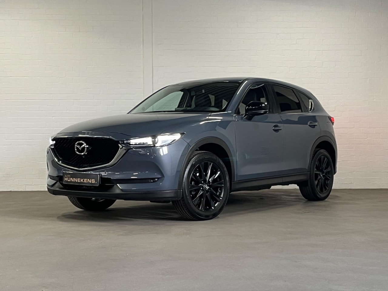 Mazda CX-5 - 2.0 Edition 100 | Leder/Alcantara | Trekhaak | HUD | 360 Camera | Stoel-/Stuur verwarming - AutoWereld.nl