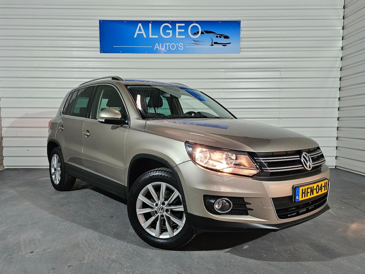 Volkswagen Tiguan - 2.0 TSI Sport&Style 4Motion / Trekhaak - AutoWereld.nl