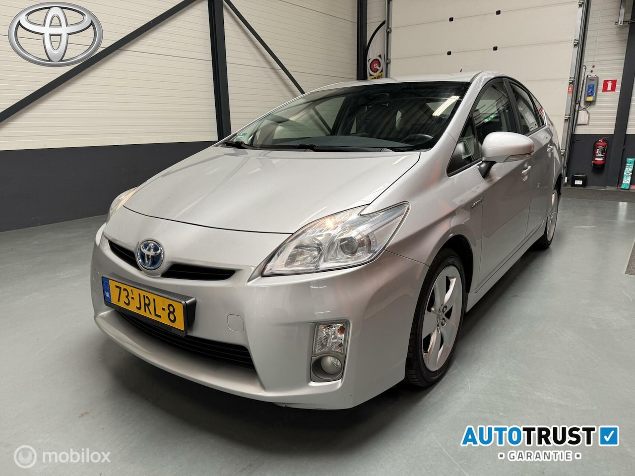 Toyota Prius - 1.8 Aspiration Navi|Keyless|HUD|NAP - AutoWereld.nl