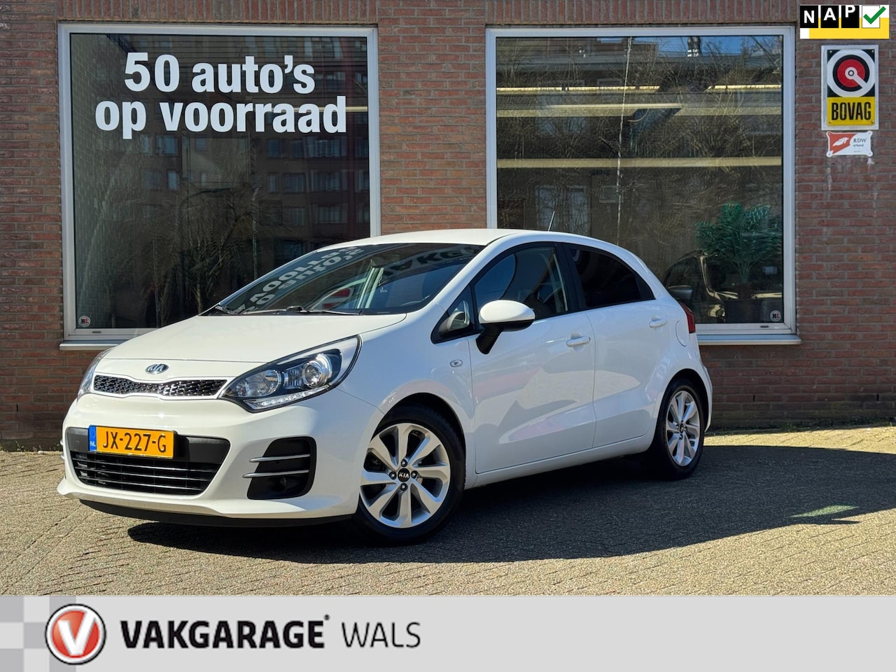 Kia Rio - 1.2 CVVT DYNAMICLINE | AIRCO | NAVI | VELGEN | PDC | CRUISE | NAP - AutoWereld.nl