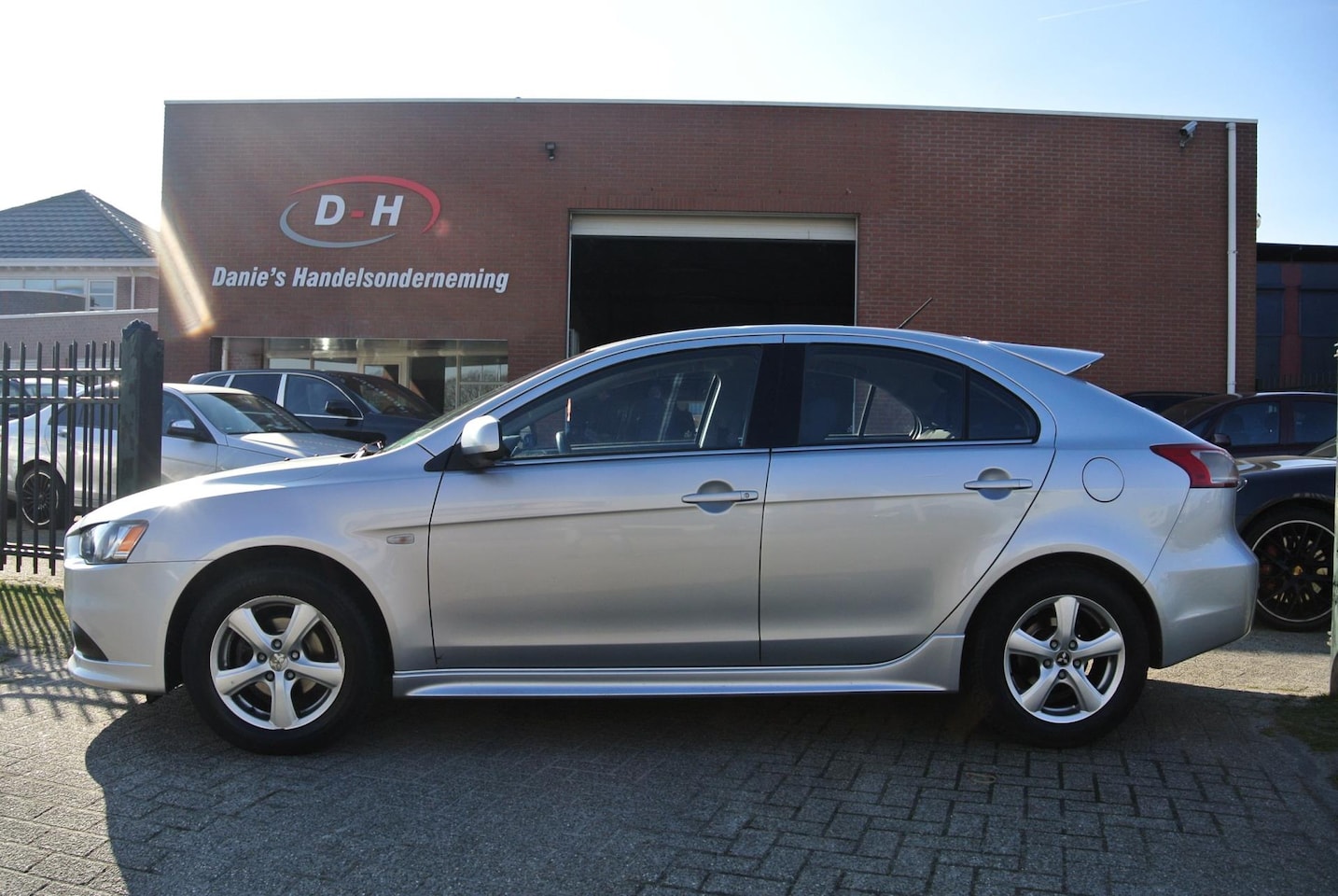 Mitsubishi Lancer Sportback - 1.8 Intense aico inruil mogelijk nap - AutoWereld.nl