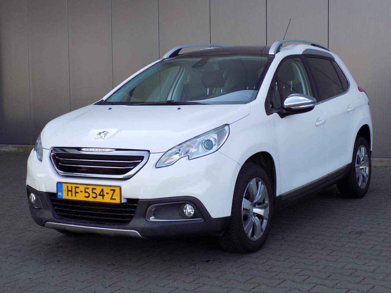 Peugeot 2008 - 1.2 PureTech Allure Xenon - AutoWereld.nl