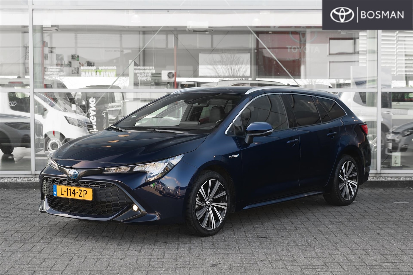 Toyota Corolla Touring Sports - 1.8 Hybrid 122pk CVT TeamNL - AutoWereld.nl