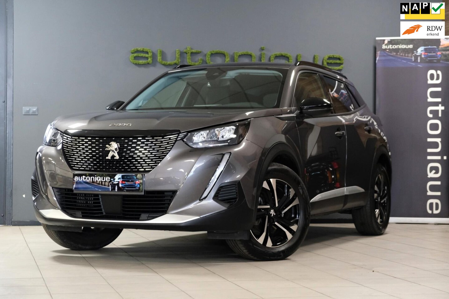 Peugeot 2008 - 1.2 PureTech Allure |35.204km| *Half Leder/Camera* Meerdere op voorraad - AutoWereld.nl