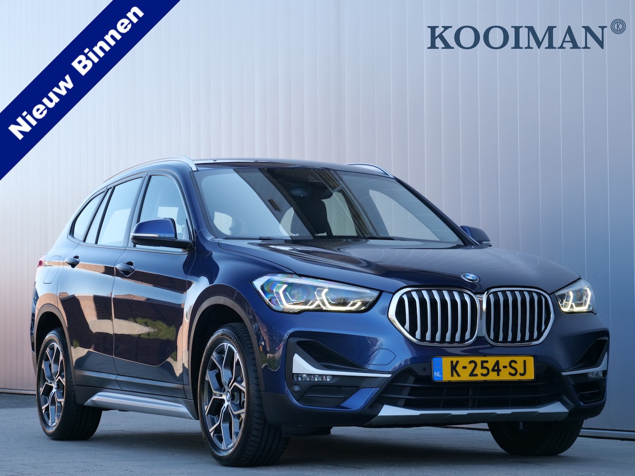 BMW X1 - sDrive18i 140pk High Executive AUTOMAAT Trekhaak / Navigatie / LED / Keyless entry - AutoWereld.nl