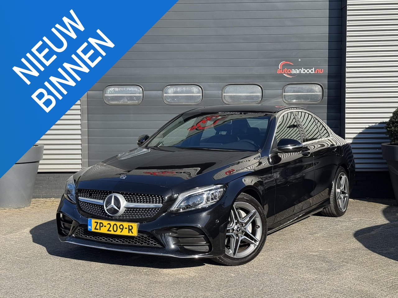 Mercedes-Benz C-klasse - 180 AMG Business Solution Plus Upgrade Edition | Camera | Sfeerverlichting | Navigatie | 1 - AutoWereld.nl