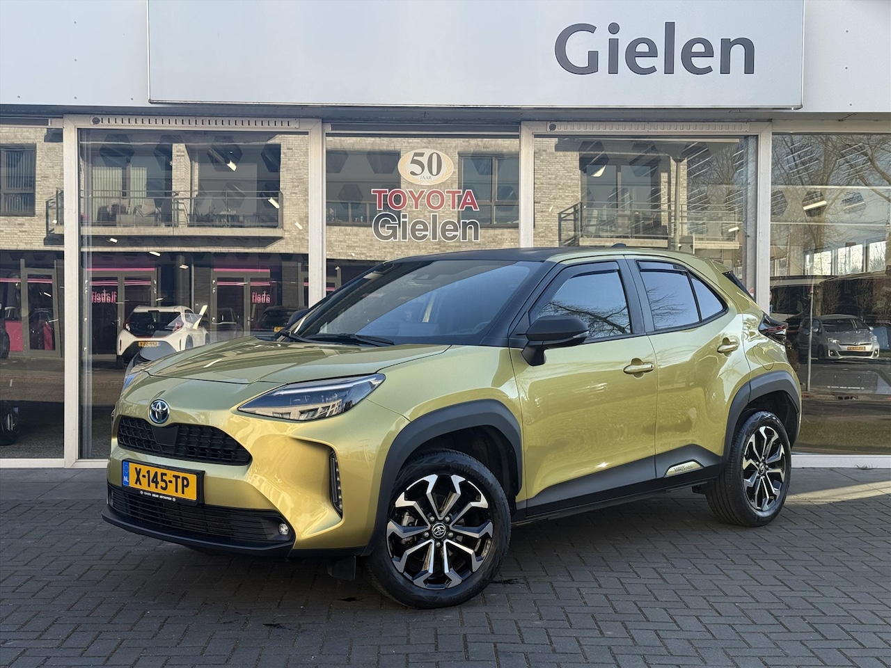 Toyota Yaris Cross - 1.5 Hybrid First Edition | Smart connect, Stoel + Stuurverwarming, Parkeercamera, Keyless, - AutoWereld.nl