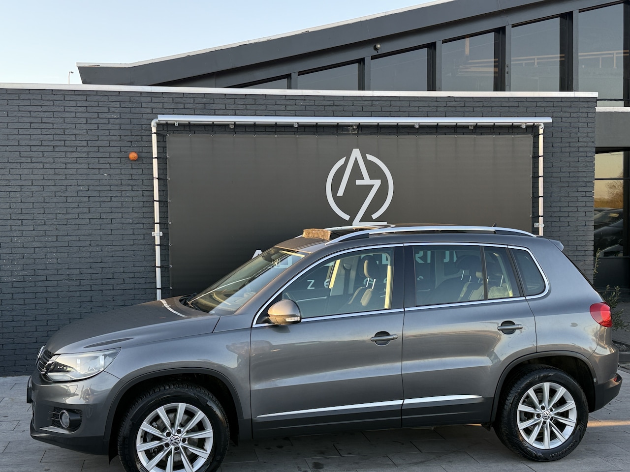 Volkswagen Tiguan - 1.4 TSI Sport&Style panorama dak ! - AutoWereld.nl