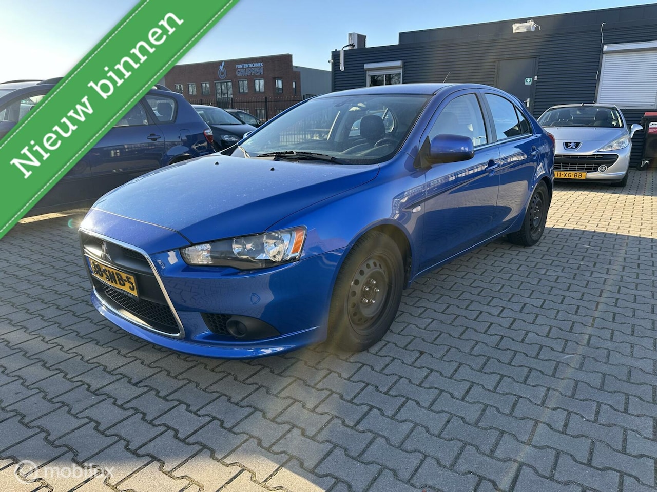 Mitsubishi Lancer Sportback - 1.6 Edition One 1.6 Edition One - AutoWereld.nl