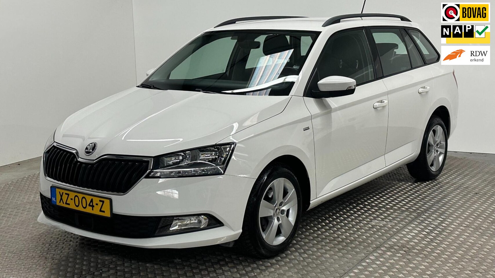 Skoda Fabia Combi - 1.0 TSI Clever benzine navigatie parkeersensoren cruisecontrole klimaatregeling - AutoWereld.nl