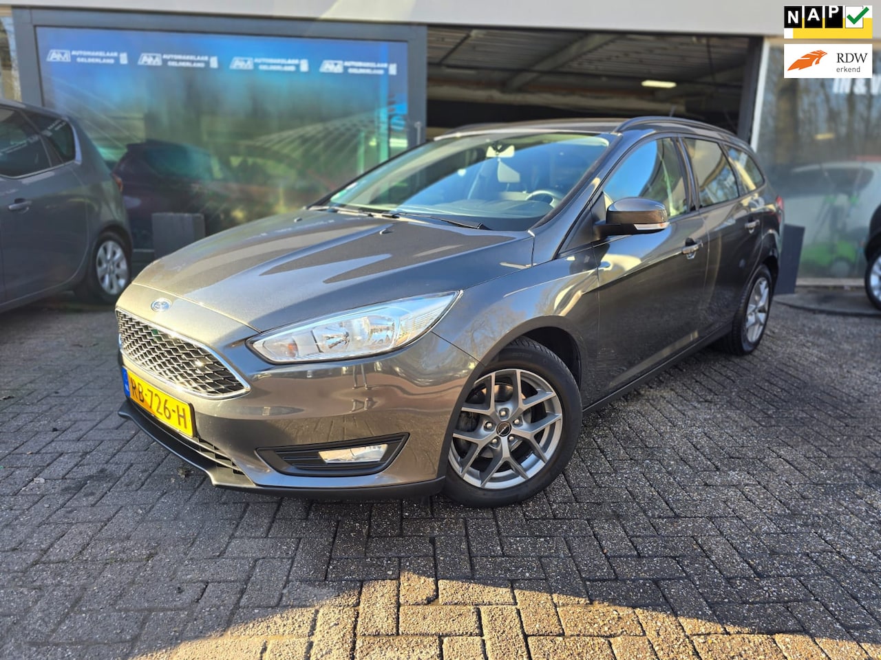 Ford Focus Wagon - 1.0 Lease Edition | 2E EIGENAAR | 12MND GARANTIE | NAVI | CRUISE | LMV | PDC | - AutoWereld.nl