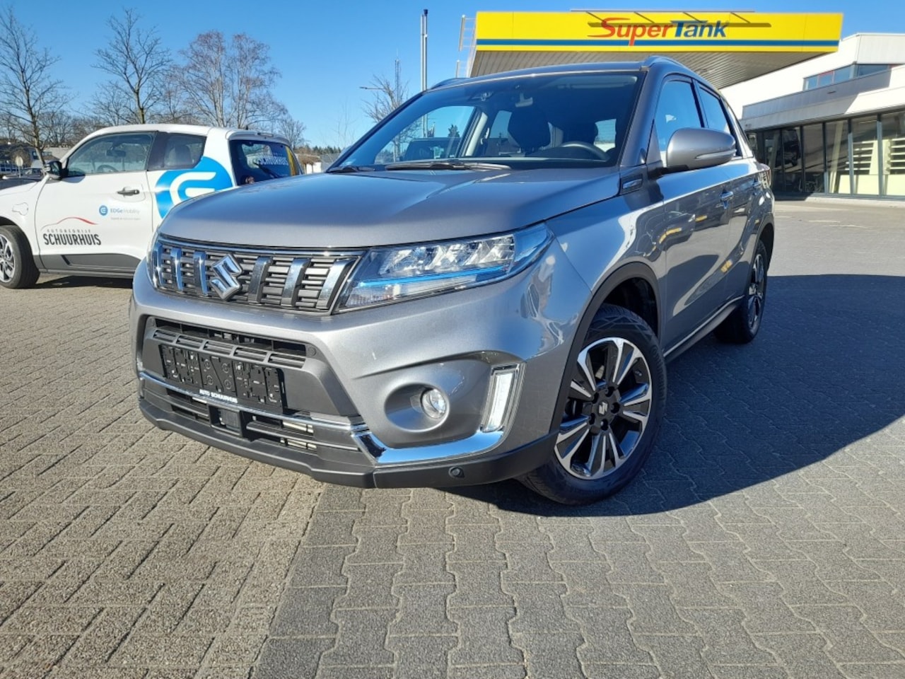 Suzuki Vitara - 1.4 STYLE HALF-LEER NAVI CAMERA ADD.CRUISE - AutoWereld.nl