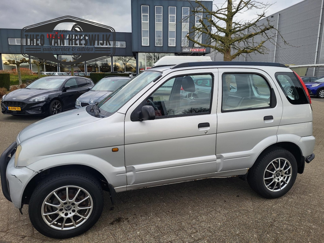 Daihatsu Terios - 1.3 4WD SXE 1.3 4WD SXE - AutoWereld.nl