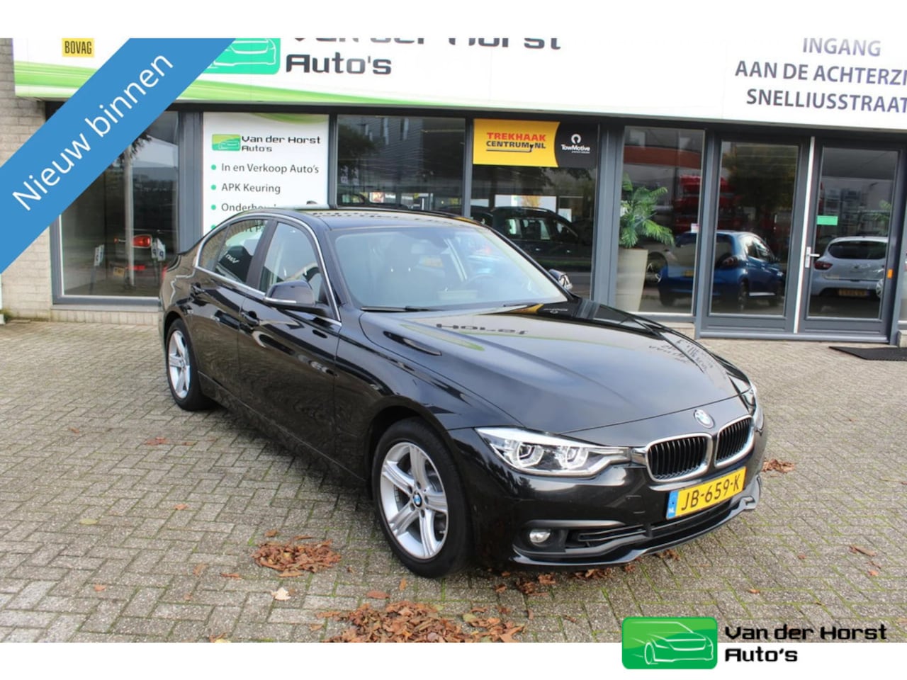 BMW 3-serie - 318i Essential NAVI LED automaat - AutoWereld.nl