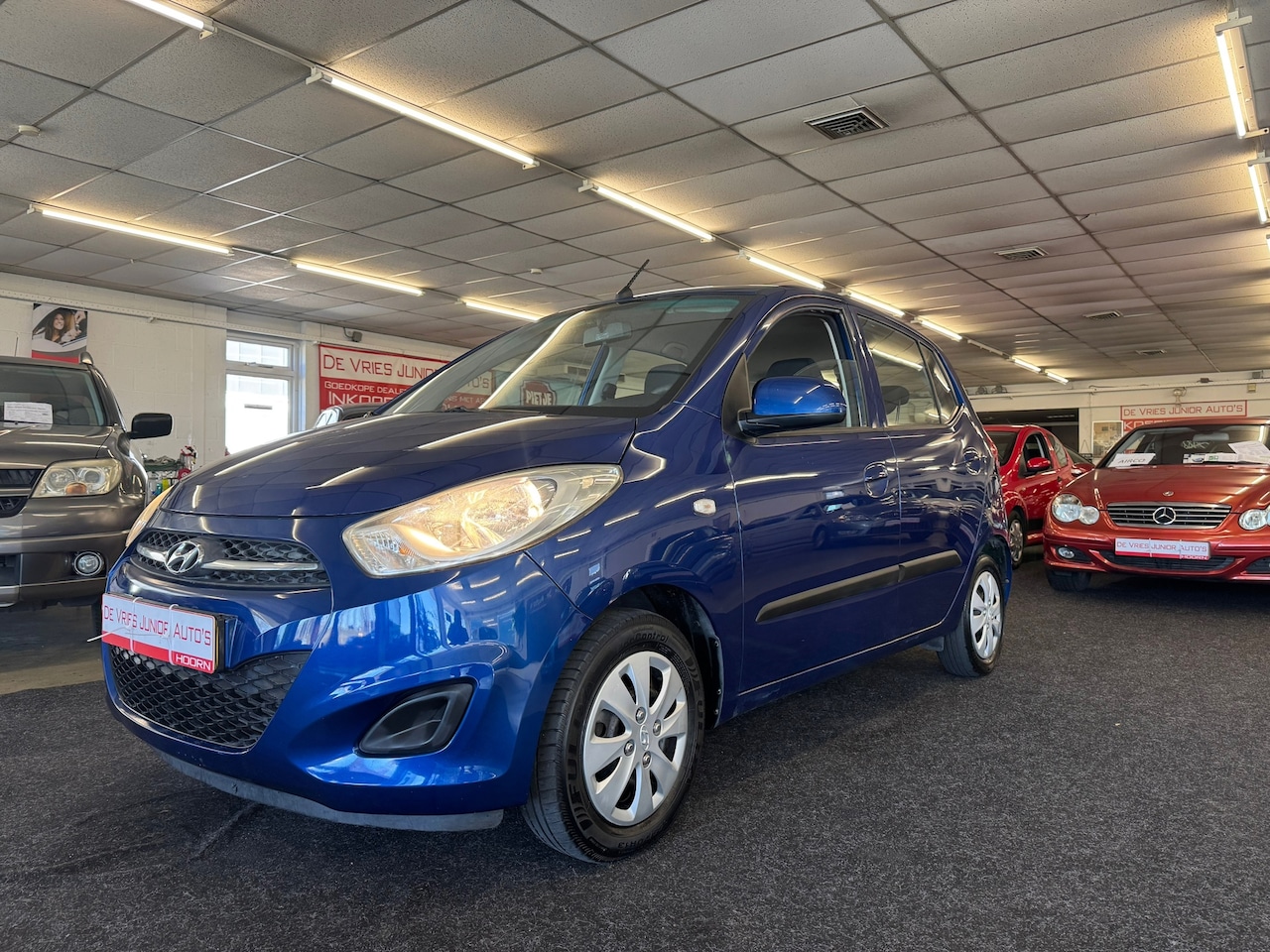 Hyundai i10 - Hyundai. 1.1 i-Drive Cool. 77000 km NAP, airco, 5-drs en meer! - AutoWereld.nl