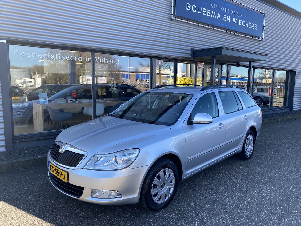 Skoda Octavia Combi - 1.6 Ambition Clima+Trekhaak - AutoWereld.nl