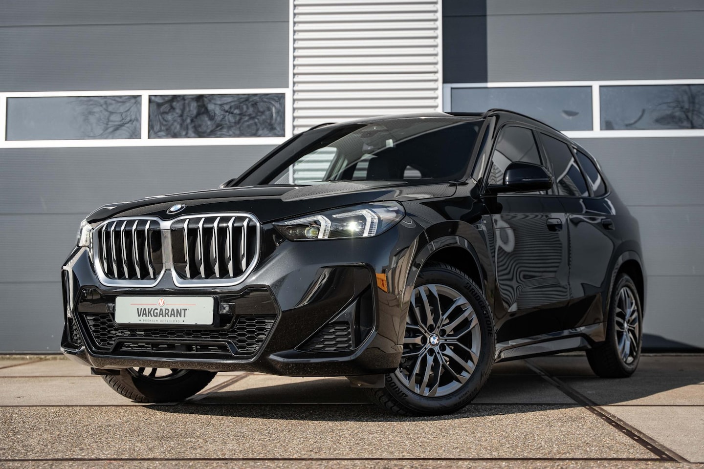 BMW X1 - sDrive18i |Panorama dak | Harman Kardon |Sfeer verlichting | - AutoWereld.nl