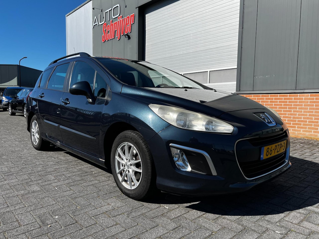 Peugeot 308 SW - 1.6 VTi Blue Lease 1.6 VTi Blue Lease (koppakking lek) - AutoWereld.nl