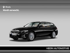 BMW 3-serie Touring - 320e | Achteruitrijcamera | Ambiente verlichting | Stoelverwarming | Glazen panoramadak |