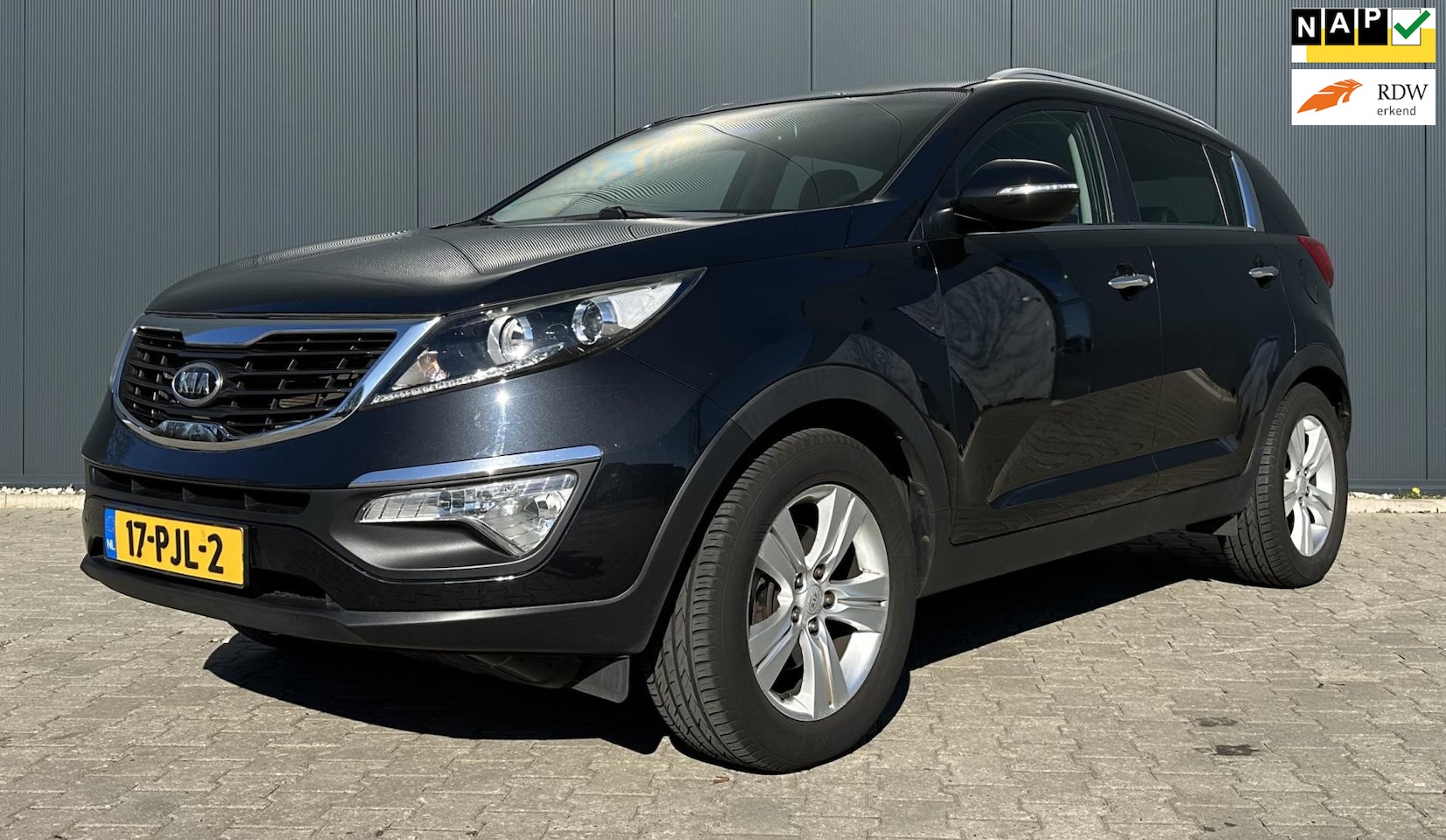 Kia Sportage - 1.6 GDI X-ecutive Plus Pack Airco Cruise Leder Trekhaak - AutoWereld.nl