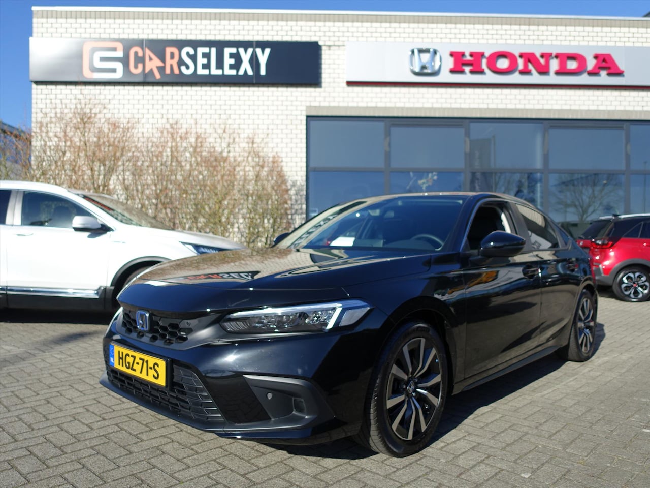 Honda Civic - 2.0 HYBRID 184PK eCVT Elegance 3595 km erop - AutoWereld.nl