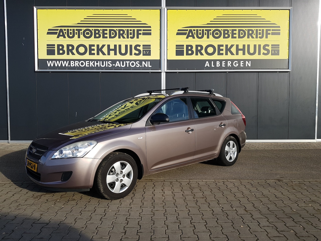 Kia Cee'd Sporty Wagon - 1.4 CVVT X-ecutive 1.4 CVVT X-ecutive - AutoWereld.nl