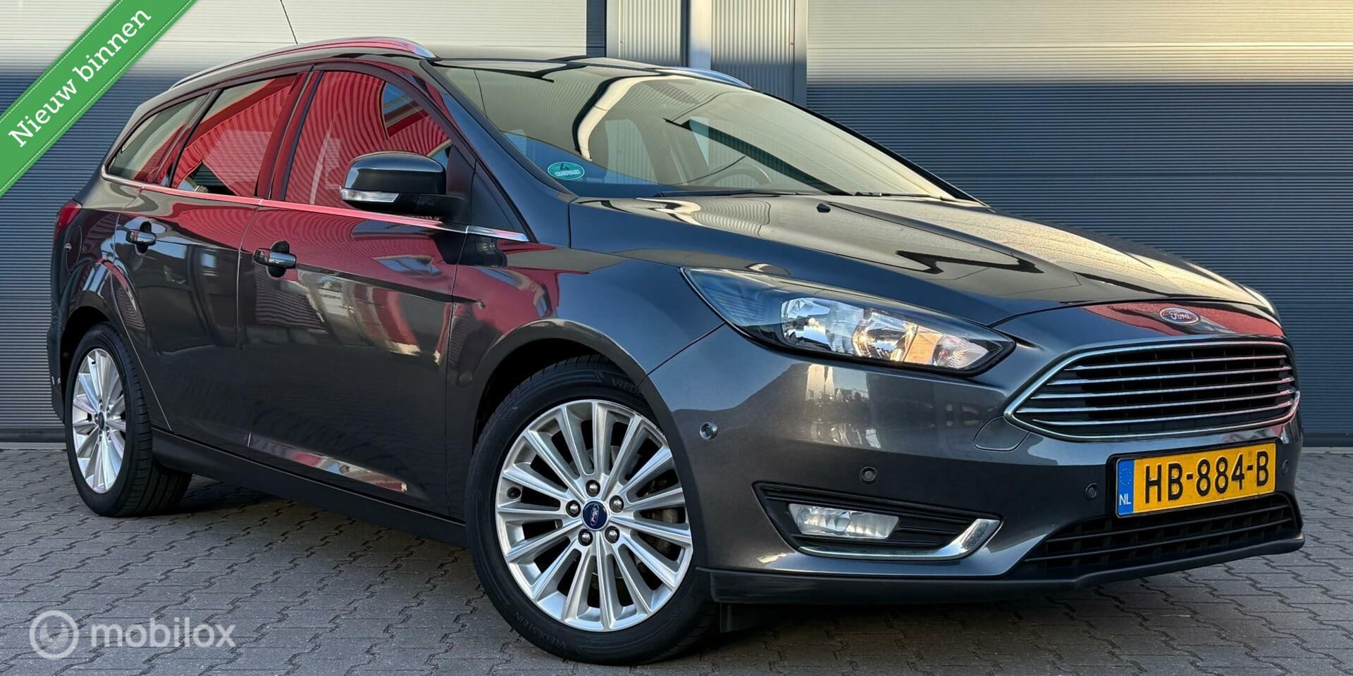 Ford Focus Wagon - 1.5 TDCI Titanium Edition Clima/Navi/LED/Cruise - AutoWereld.nl