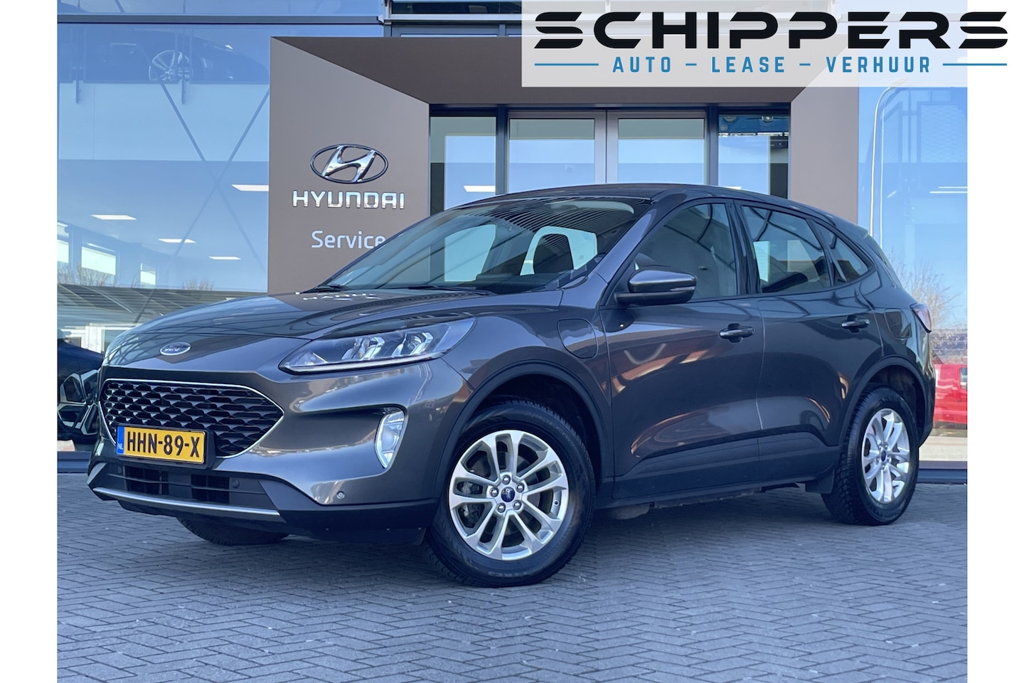 Ford Kuga - 2.5 PHEV Titanium Trekhaak | Stuur verwarmd | Parkeersensors - AutoWereld.nl