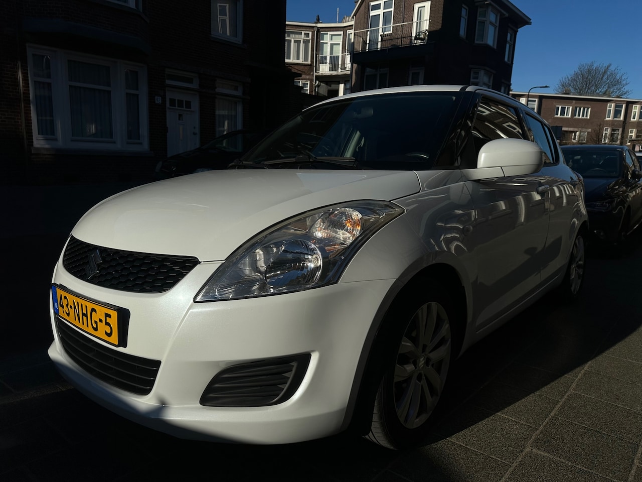 Suzuki Swift - 1.2 Comfort EASSS Airco Winterbanden Trekhaak Nette Auto - AutoWereld.nl