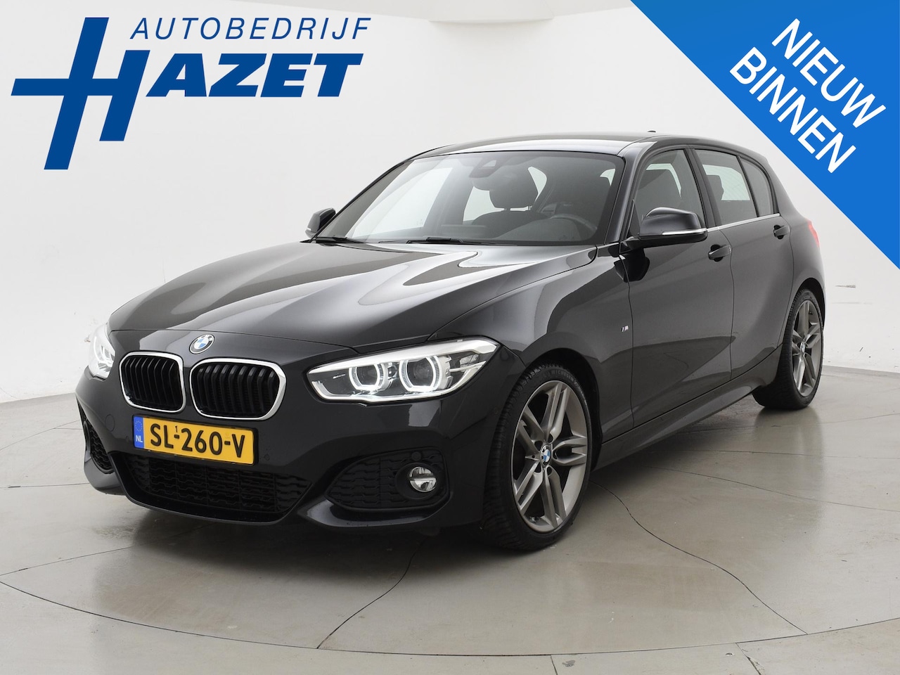 BMW 1-serie - 118i AUT8 5-DEURS M-SPORT INTERIEUR + EXTERIEUR | NAVI PROFESSIONAL | CAMERA | STOELVERW. - AutoWereld.nl