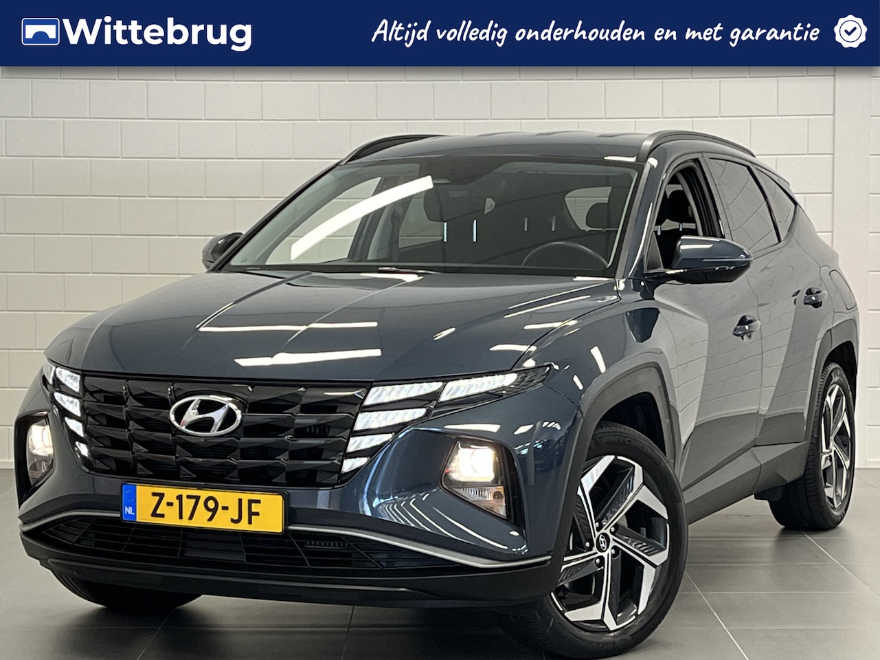 Hyundai Tucson - 1.6 T-GDI PHEV i-Motion APPLE / ANDROID NAVIGATIE | 19 INCH VELGEN | STOELVERWARMING - AutoWereld.nl