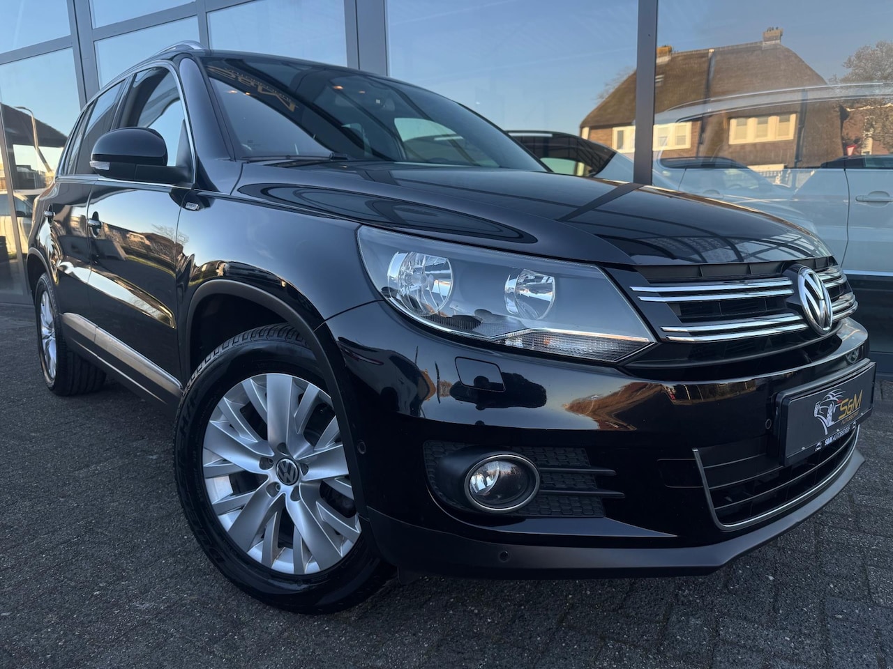 Volkswagen Tiguan - 1.4 TSI Sport&Style - AutoWereld.nl