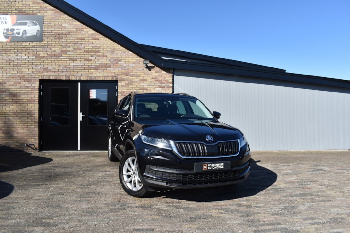 Skoda Kodiaq - 1.5 TSI BUSINESS ED. Xenon, Cruise, Camera - AutoWereld.nl