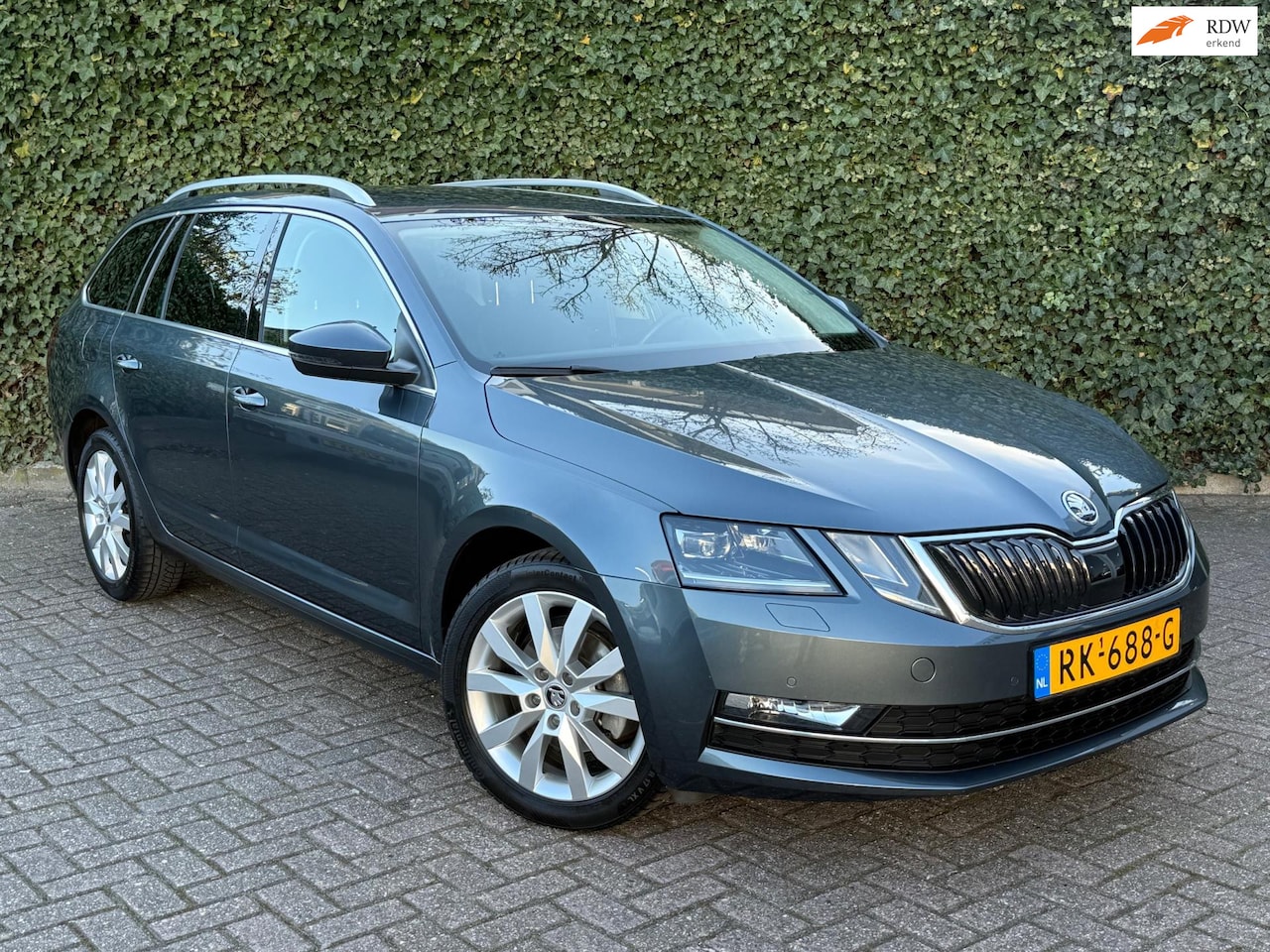 Skoda Octavia Combi - 1.4 TSI Style Business | Navi | ACC | Stoelverwarming - AutoWereld.nl