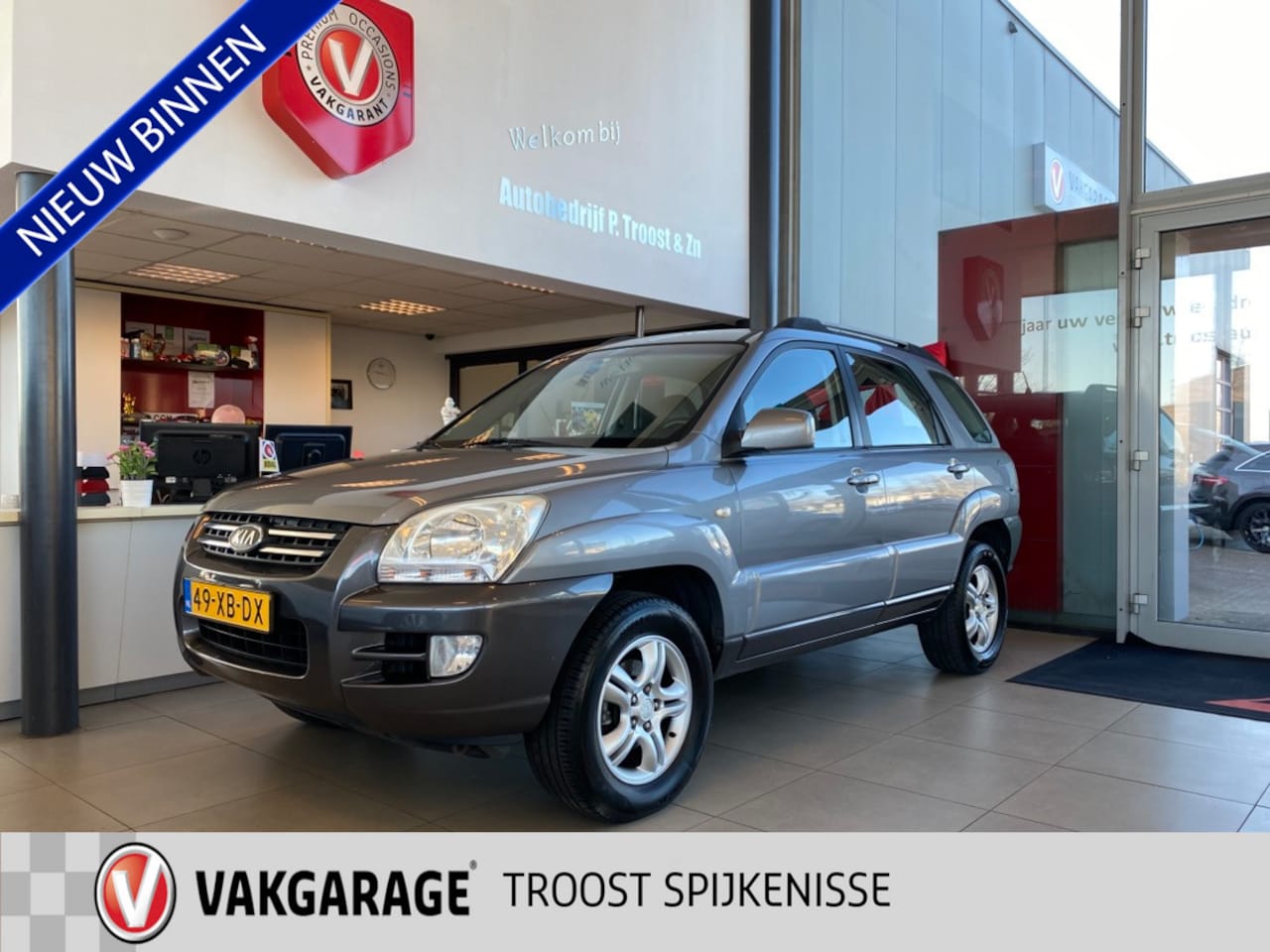 Kia Sportage - 2.0 CVVT X-ecutive 2.0 CVVT X-ecutive,100% Onderhouden,Climate&Cruisecontrol,Trekhaak,Halfleder,Elektrischpak - AutoWereld.nl