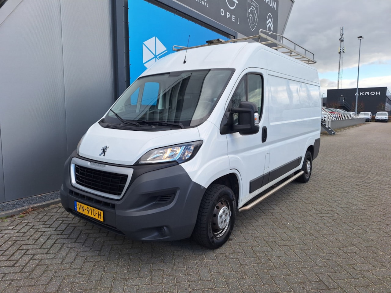 Peugeot Boxer - 333 2.2 HDI L2H2 130 pk | Imperiaal + ladder | Camera | Cruise | Airco - AutoWereld.nl