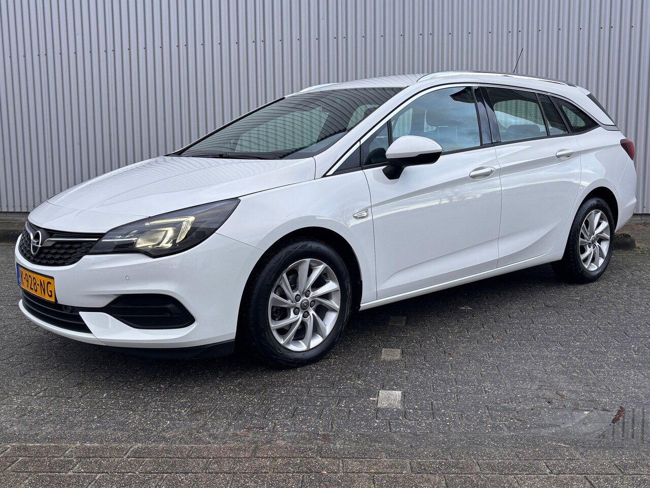 Opel Astra Sports Tourer - 1.4 Business Elegance 1.4 Business Elegance - AutoWereld.nl