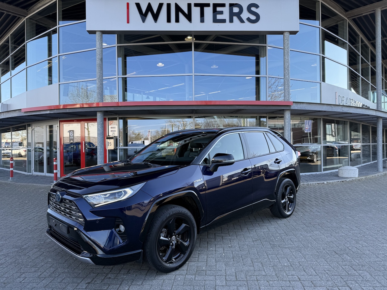 Toyota RAV4 - 2.5 Hybrid AWD Style Navi+BT+Cam Cr. Control 18" LMV Carplay Elek. stoel Adap. Cruise - AutoWereld.nl