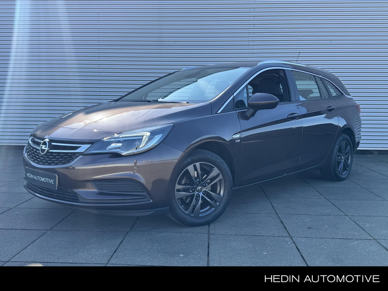 Opel Astra Sports Tourer - 1.4 Turbo 150PK 120 Jaar Edition | Navigatie | Airco | Cruise control | Carplay | LMV 16 i - AutoWereld.nl